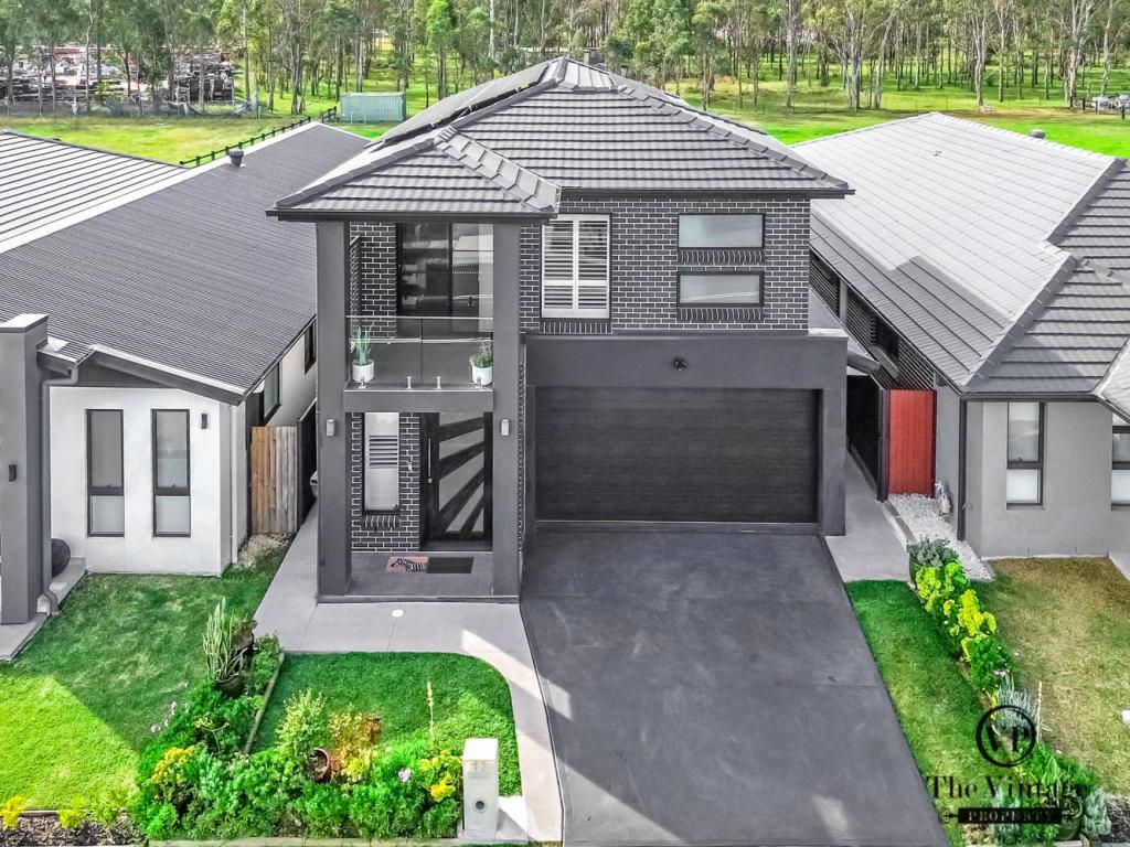 13 COPPER DR, CATHERINE FIELD, NSW 2557