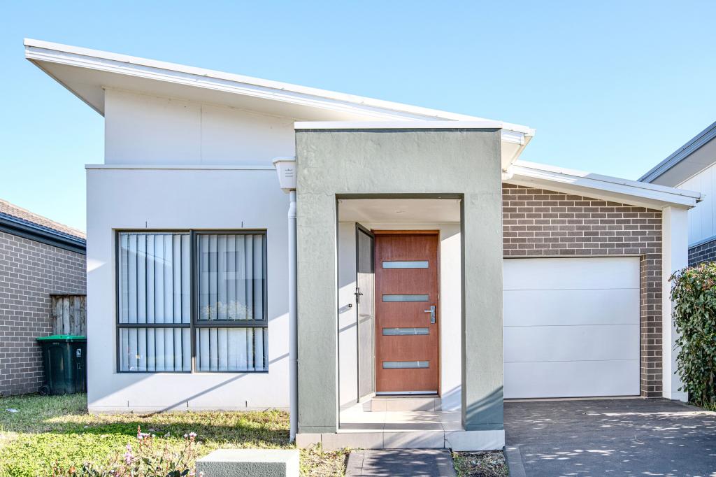 12 KINGSDALE AVE, CATHERINE FIELD, NSW 2557