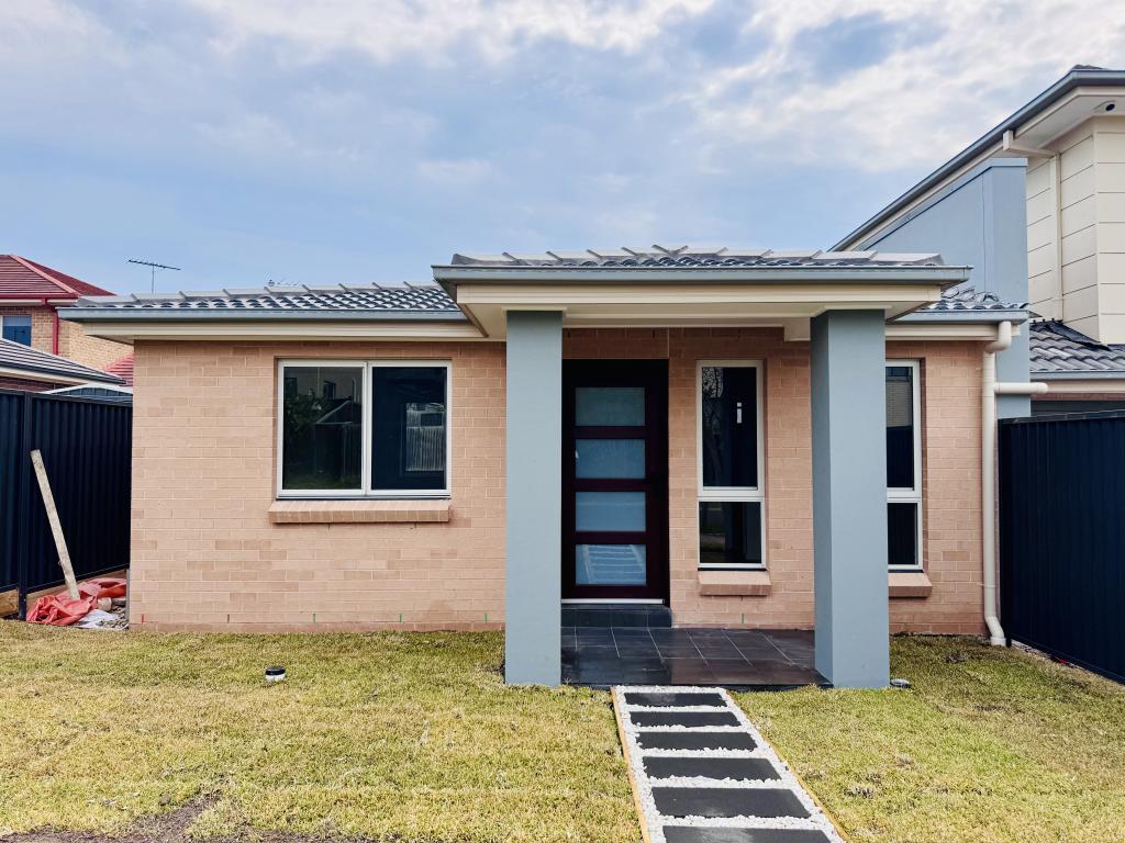 21A TALANA HILL DR, EDMONDSON PARK, NSW 2174