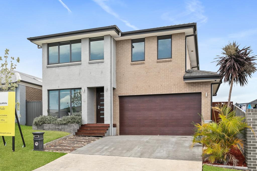 4 Wildflower Cres, Calderwood, NSW 2527