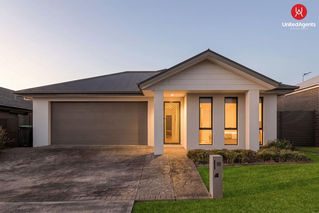 11 DUNCOMBE AVE, GLEDSWOOD HILLS, NSW 2557