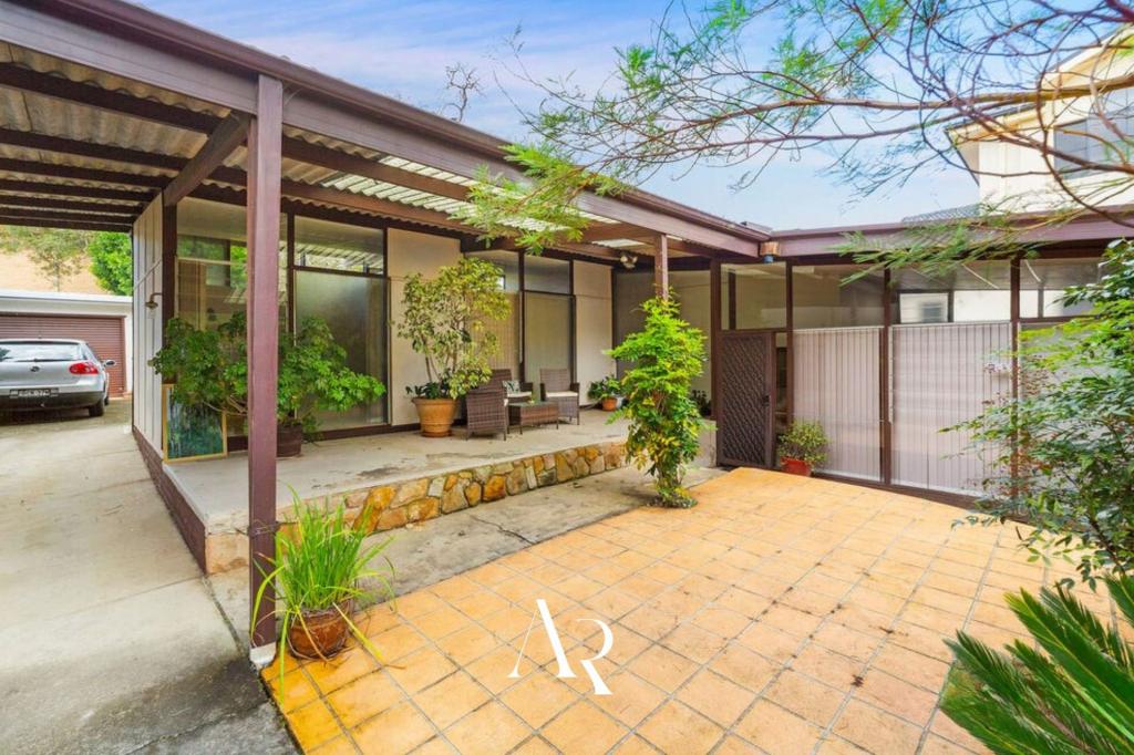 579 HENRY LAWSON DR, EAST HILLS, NSW 2213