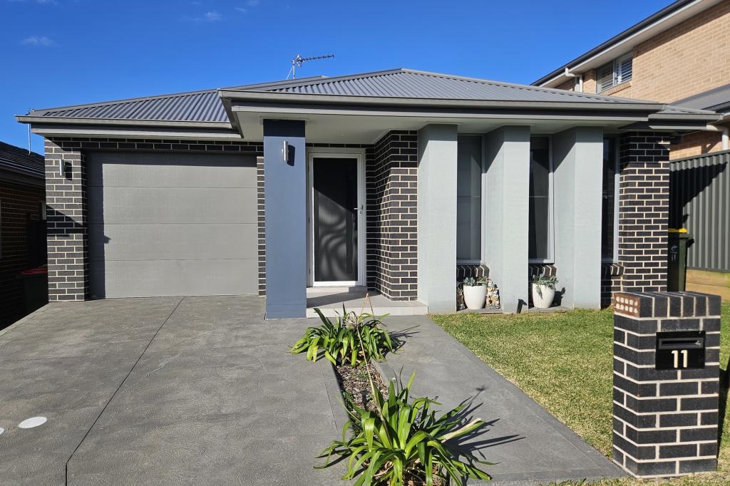 11 WILDFLOWER CRES, CALDERWOOD, NSW 2527