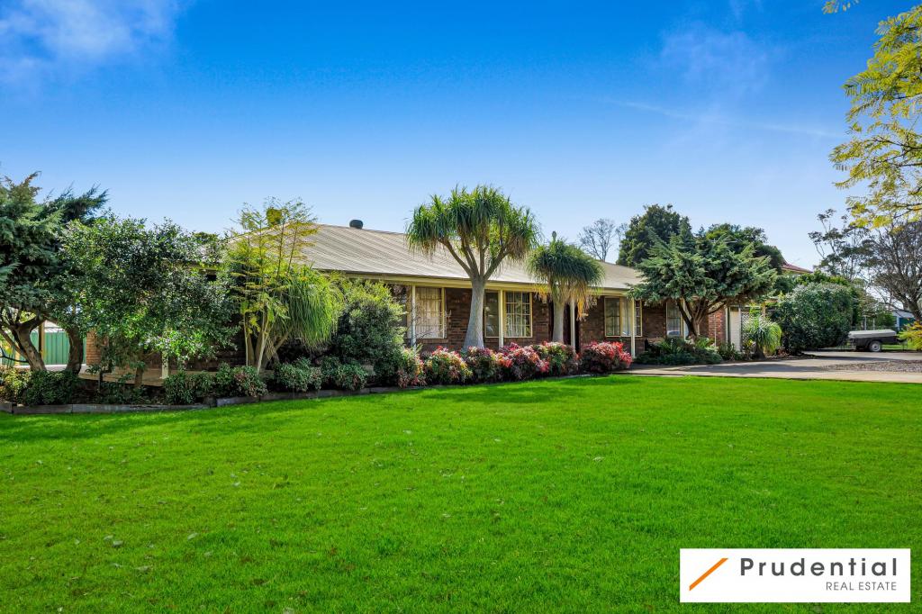 5 CHISHOLM RD, CATHERINE FIELD, NSW 2557