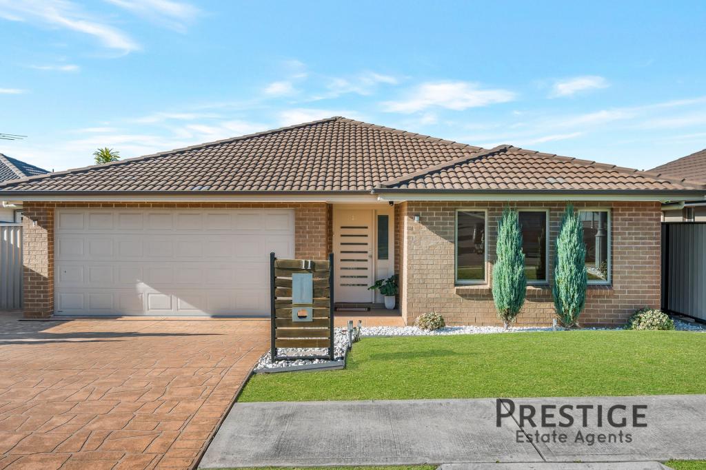 11 Laurieton Rd, Carnes Hill, NSW 2171