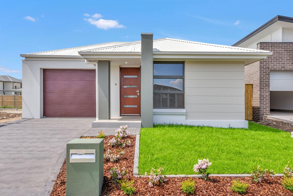 15 KINGSDALE AVE, CATHERINE FIELD, NSW 2557