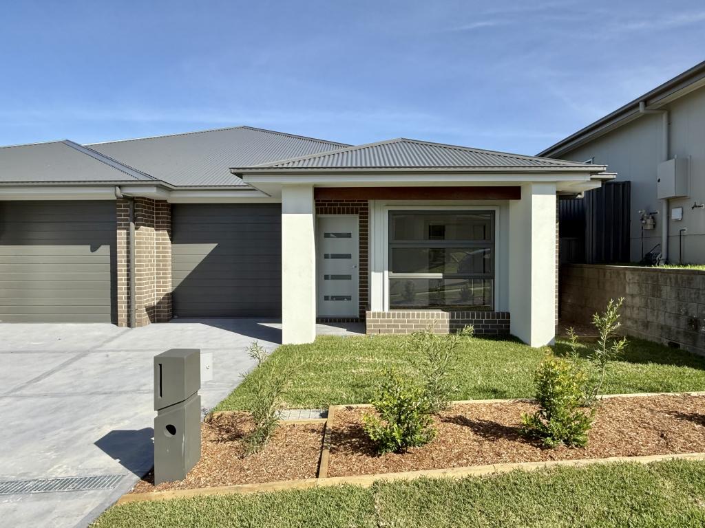 7B MORTLOCK RD, CAMERON PARK, NSW 2285