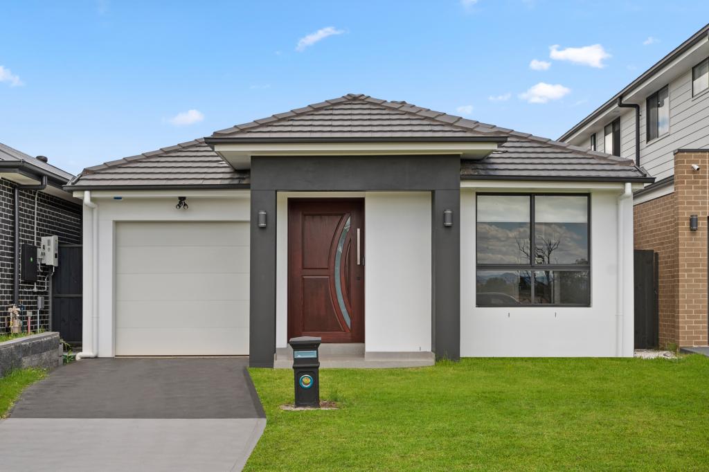 63 RIBBONWOOD CRES, MARSDEN PARK, NSW 2765