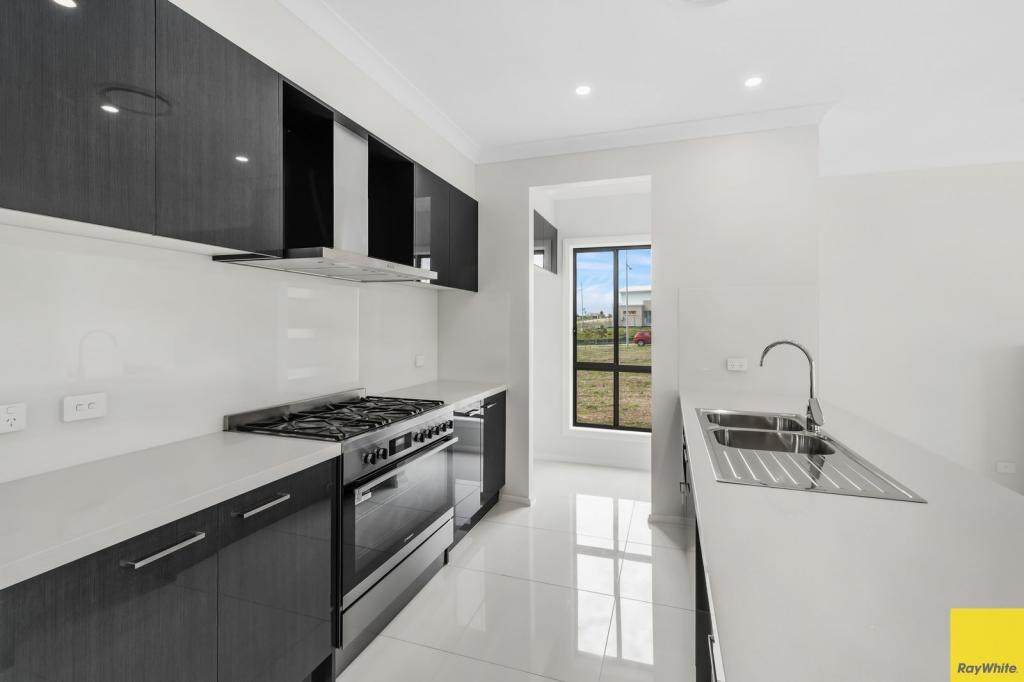 4 White Cedar Cct, Huntley, NSW 2530