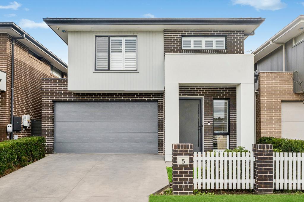 5 ROWLAND AVE, CATHERINE FIELD, NSW 2557