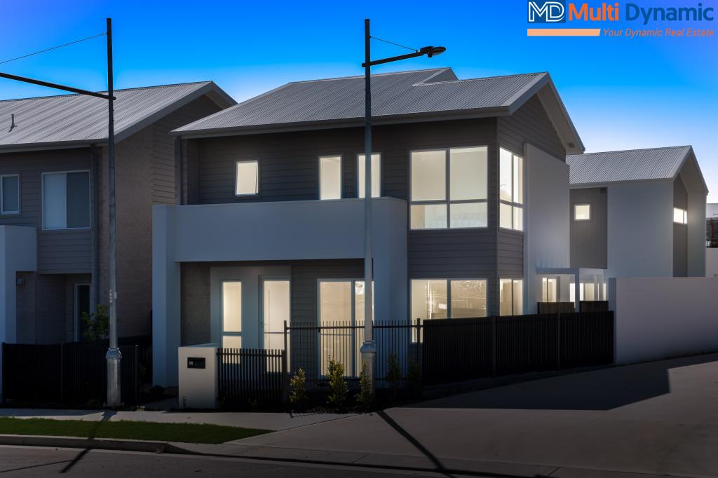 22 BOWERBIRD LOOP, ORAN PARK, NSW 2570