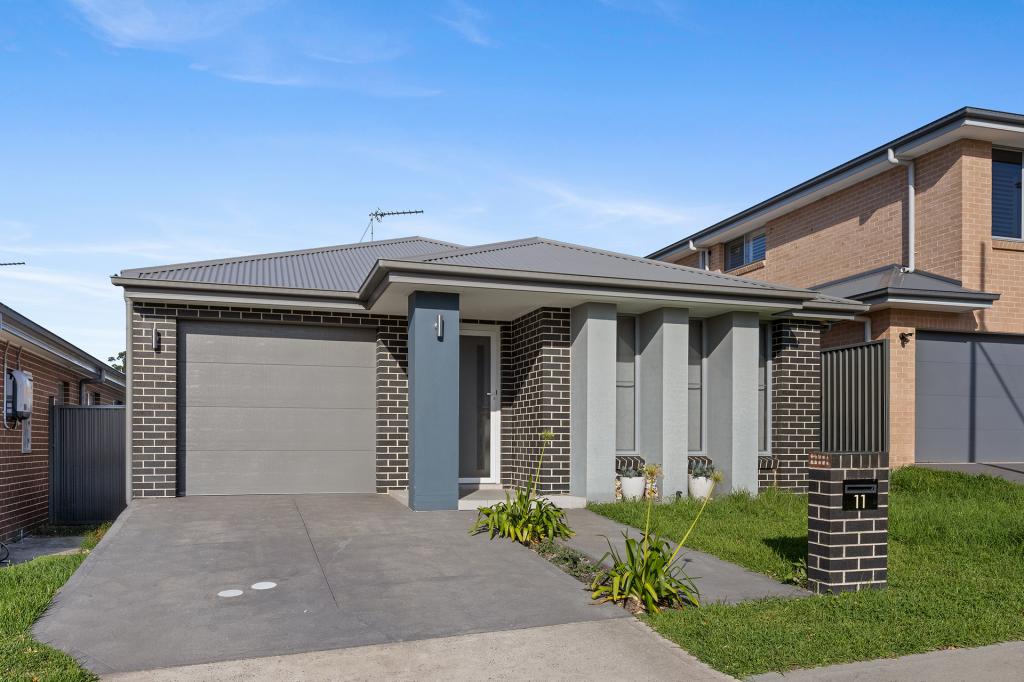 11 Wildflower Cres, Calderwood, NSW 2527