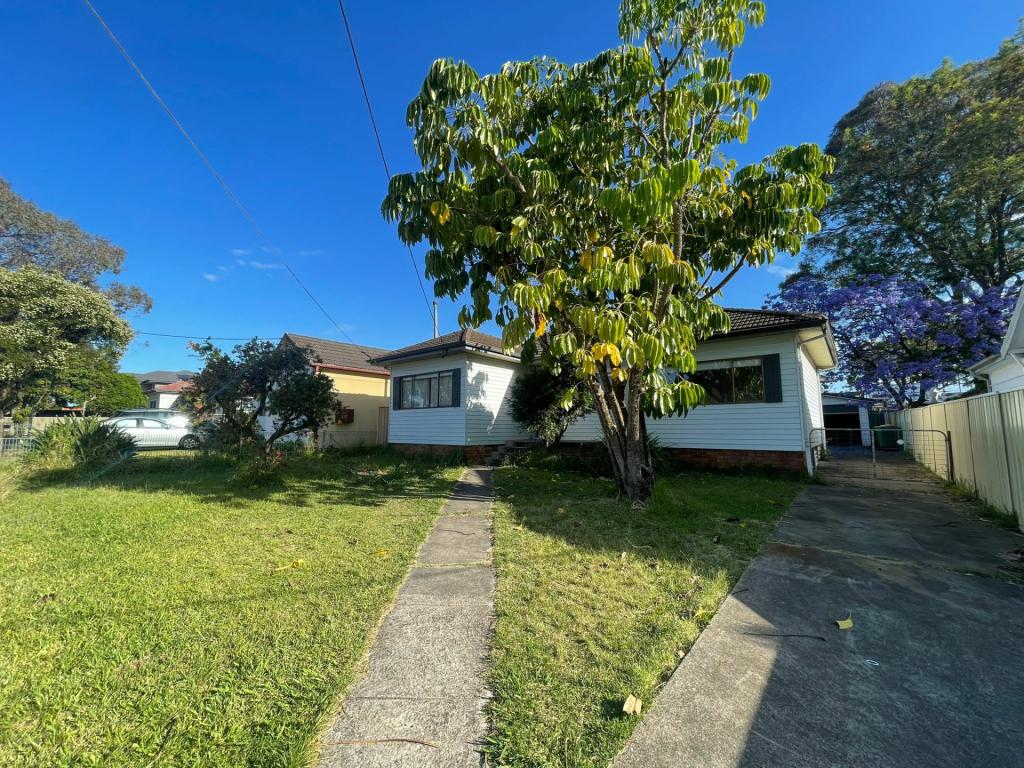 27 Parliament Rd, Macquarie Fields, NSW 2564