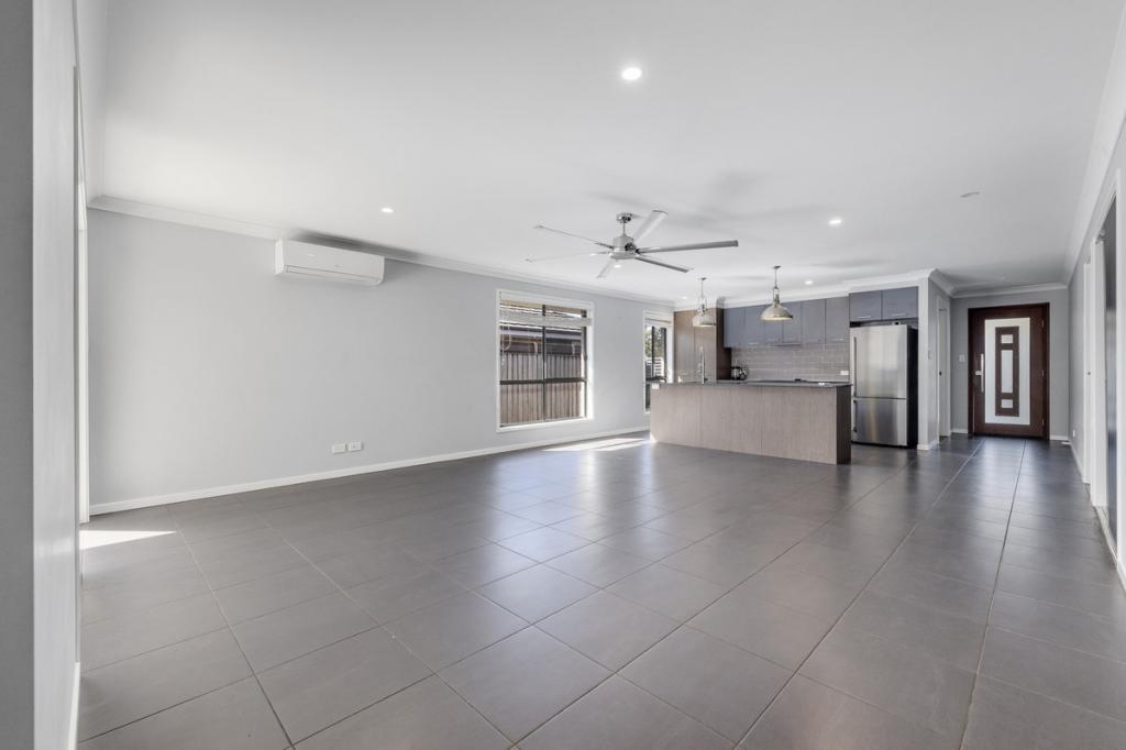 13 Graduation St, Thrumster, NSW 2444