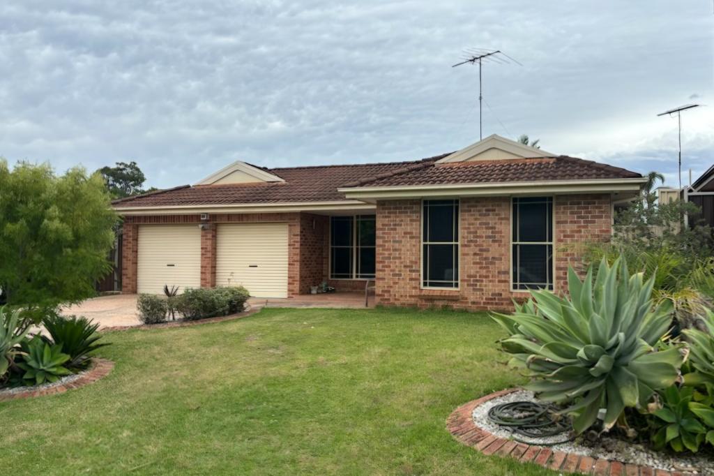 22 MACKINNON ST, ST HELENS PARK, NSW 2560