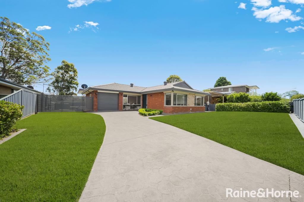 12 FERGUSSON ST, GLENFIELD, NSW 2167
