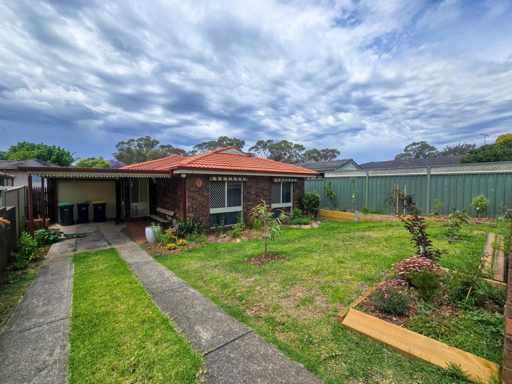 7 Gentian Ave, Macquarie Fields, NSW 2564
