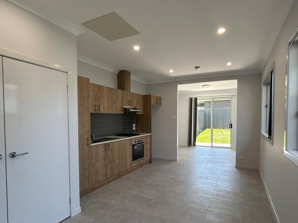 68 GRASSBIRD AVE, ORAN PARK, NSW 2570