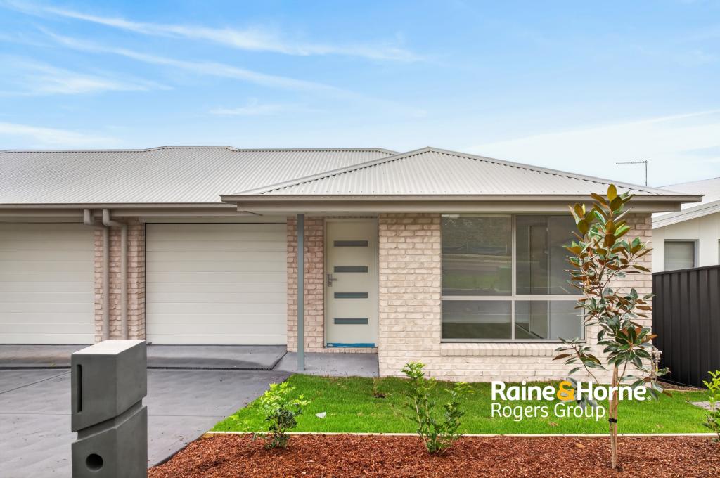 18A TURNOCK DR, CAMERON PARK, NSW 2285