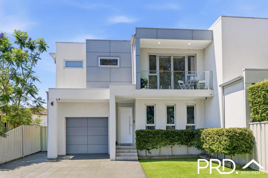 911 Henry Lawson Dr, Picnic Point, NSW 2213