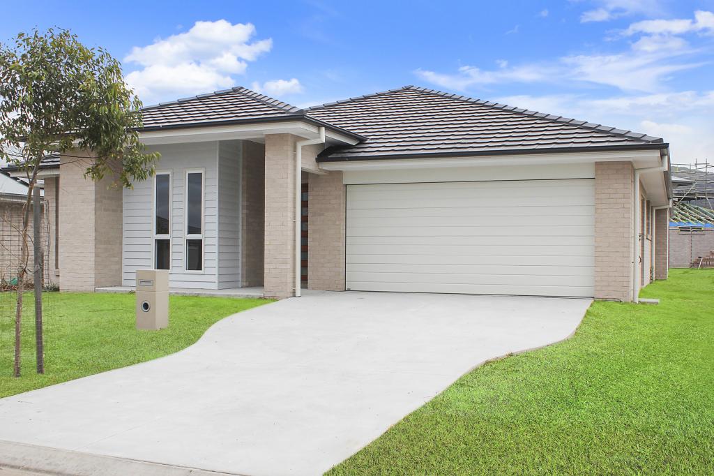 153 SCARBOROUGH WAY, DUNBOGAN, NSW 2443