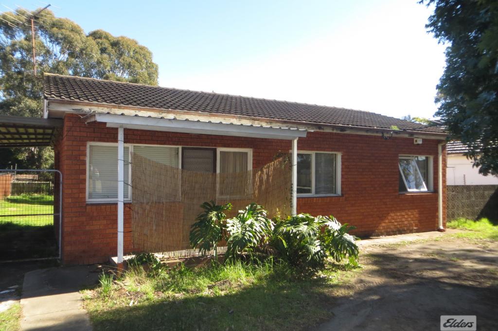 214 THE HORSLEY DR, FAIRFIELD, NSW 2165